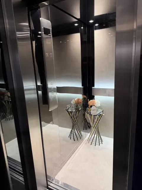 Cabin with button panel, LED lighting and flowers