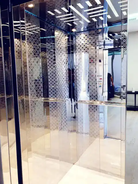 Cabin with etched mirror-glass pattern panels