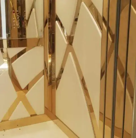 Close-up of gold and cream geometric cabin wall panels