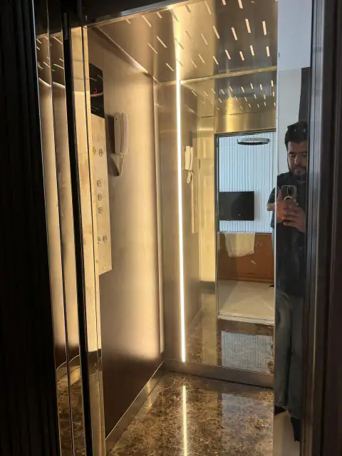 Cabin with marble floor, LED strips and wood panel